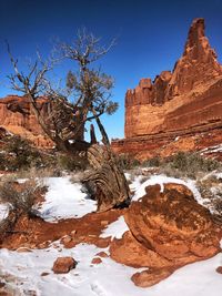 Rock formations on snow covered landscape