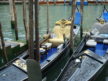 Gondolas moored on canal