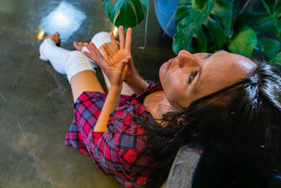 High angle view of woman lying down