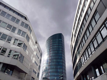 Low angle view of modern buildings against sky