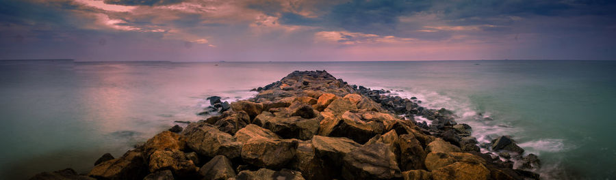 Panoramic view of sea against sky during sunset