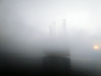 Scenic view of buildings in city against sky