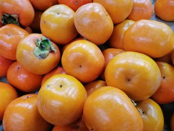 Full frame shot of oranges at market stall