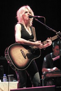 Young woman playing guitar