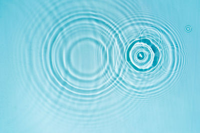 Transparent blue clear water surface texture with ripples