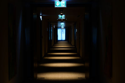 Illuminated corridor of building