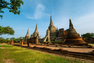 Old temple against building