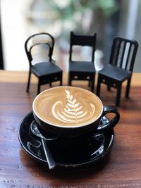 Coffee cup on table