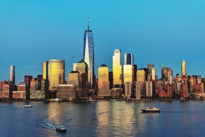 View of buildings in city at waterfront