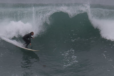 Man surfing in sea