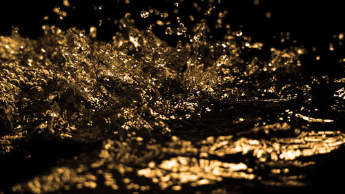 Full frame shot of illuminated water at night