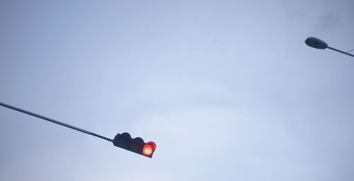 Low angle view of street light against clear sky