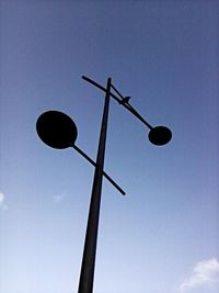 Low angle view of street light against clear sky