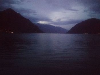 Scenic view of sea against sky at night