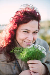 Portrait of young woman smiling