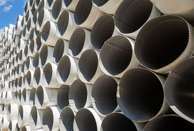 Downpipe warehouse. steel pipes, parts for the construction of a roof drainage system in a warehouse