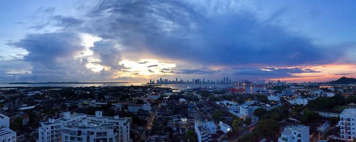 High angle view of townscape against sky at sunset