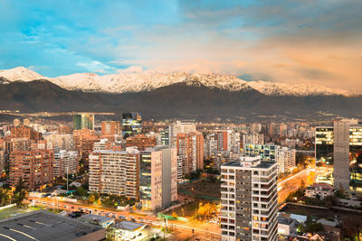 Apartment buidings at las condes with the andes mountain range in the back, santiago de chile