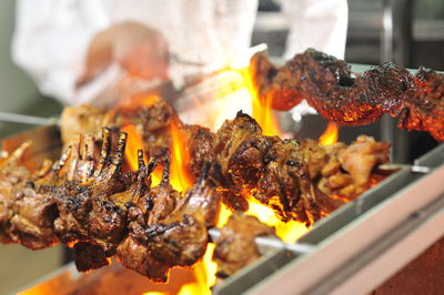 Close-up of meat on barbecue grill