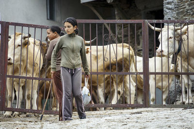 Young woman standing on ground