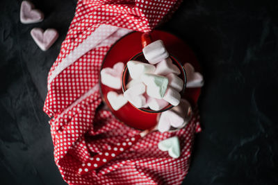 Directly above shot of marshmallows in cup 