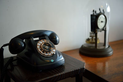 High angle view of telephone on table