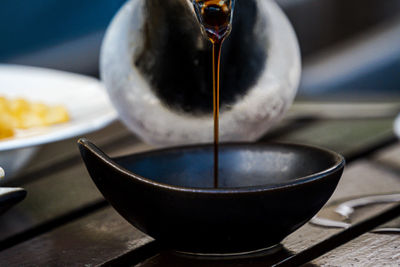 Close-up of tea cup on table