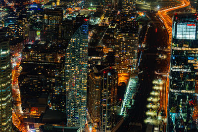 High angle view of illuminated cityscape at night