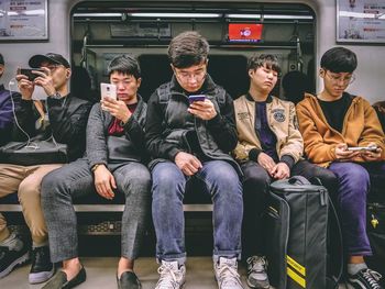 Group of people sitting in bus