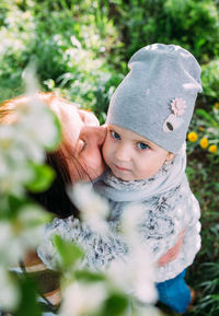 Portrait of young woman wearing hat