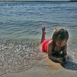 Woman standing on beach