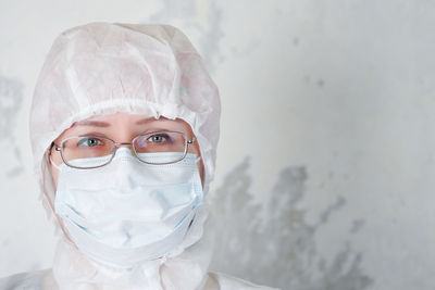 Portrait of doctor wearing protective workwear