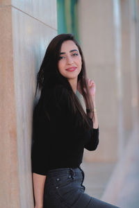 Portrait of smiling young woman