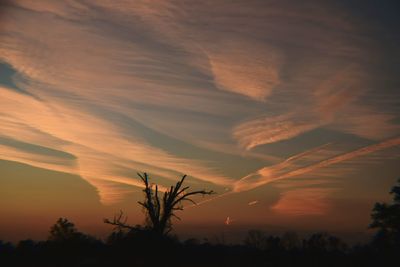 Scenic view of landscape at sunset