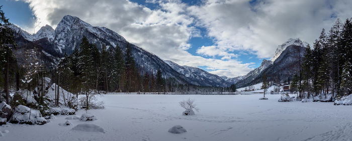 Scenic view of snowcapped mountains against sky