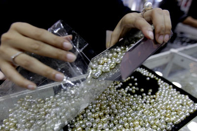 Midsection of person preparing food