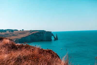 Scenic view of sea against clear sky