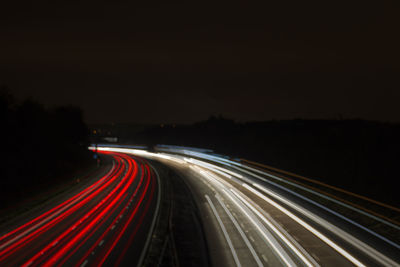 Light trails on road at night