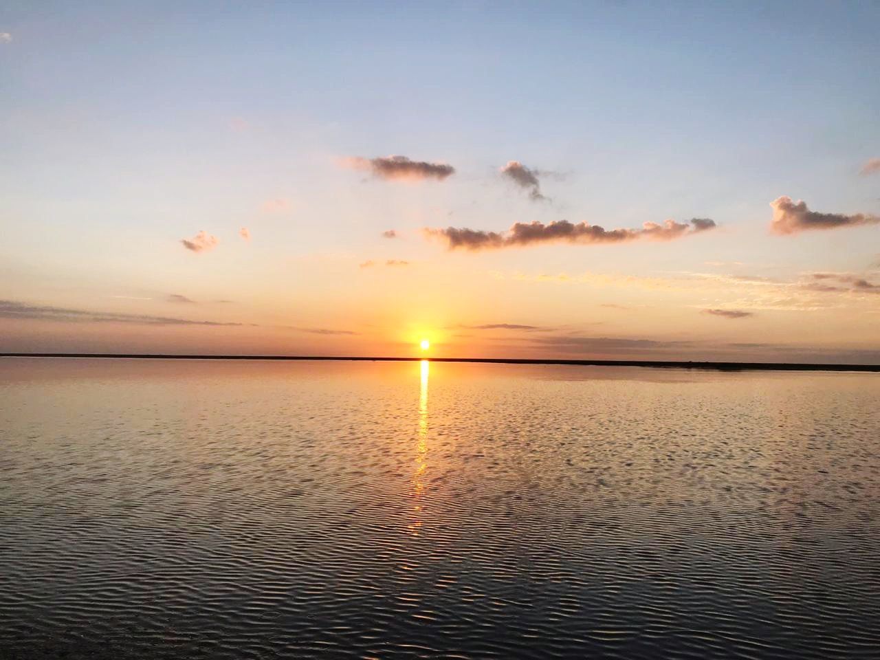 sunset, sky, scenics - nature, beauty in nature, tranquility, tranquil scene, water, sea, orange color, idyllic, cloud - sky, reflection, horizon, horizon over water, waterfront, no people, sun, nature, non-urban scene, outdoors, romantic sky