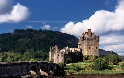 Old building against cloudy sky