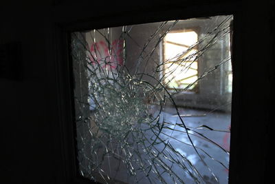 Close-up of window of abandoned building