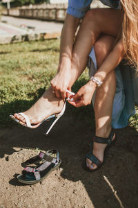 Comfortable shoes, proper shoes good to feet. close up of female legs in high heels 