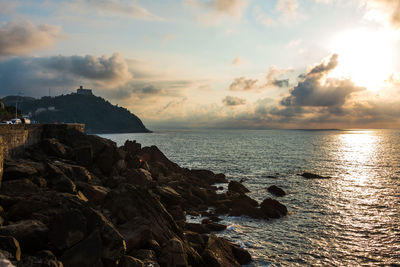 Scenic view of sea against sky during sunset