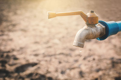 Close-up of faucet outdoors