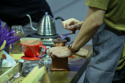 Close-up of man preparing food