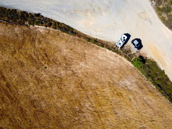 High angle view of road amidst field