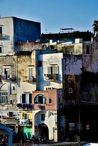 Residential buildings against sky in city