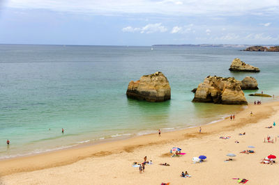 View of people relaxing on beach