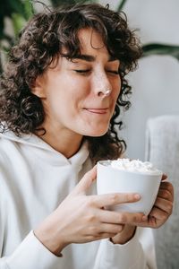 Portrait of mid adult man holding drink