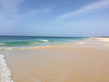 Scenic view of beach against sky